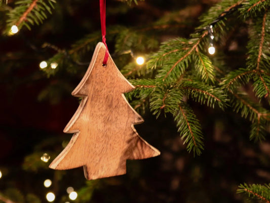 Beautiful Christmas decorations made of olive wood