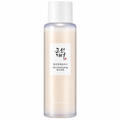 Beauty of Joseon Glow Replenishing Rice Milk: Flasche mit milchig-beiger Flüssigkeit, weißer Kappe und Etikett