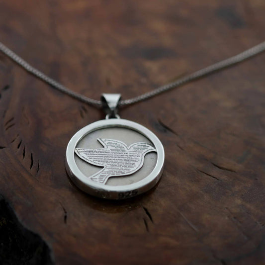 Silver Jerusalem Stone Pendant with Dove and the Word "Shalom" in Different Languages